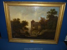 An Oil on canvas in gilt frame depicting a fortified building in woodlands, 28" x 22",