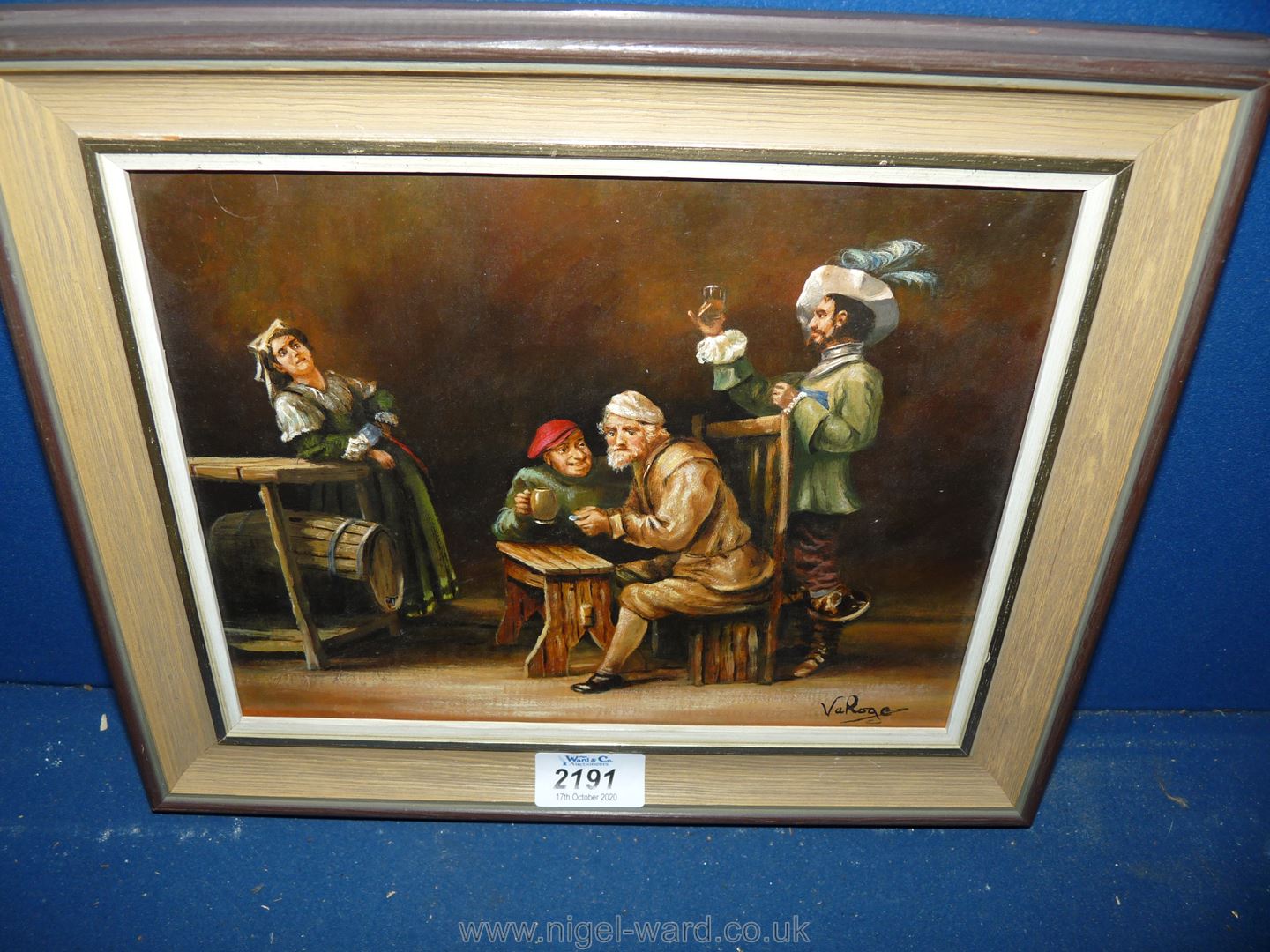 A framed Oil on board of three gentlemen and a lady in an ale house, signed lower right Va Roge,