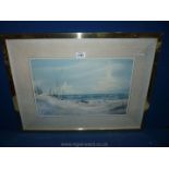 A framed Print of a beach scene with figures and a boat.