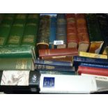 A box of books including Sherlock Holmes, Conan Doyle, Dickens, etc.