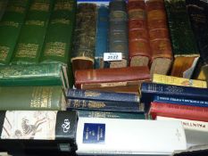 A box of books including Sherlock Holmes, Conan Doyle, Dickens, etc.