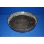 A large heavy copper dinner Gong, (lacking frame).