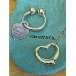 A Genuine Tiffany & Co Elsa Peretti Sterling Silver 925 Spain Heart Necklace together with a