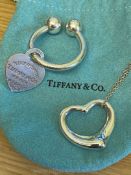 A Genuine Tiffany & Co Elsa Peretti Sterling Silver 925 Spain Heart Necklace together with a