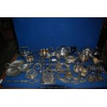 A large quantity of silver plate including teapots, stands, etc.