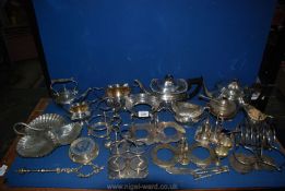 A large quantity of silver plate including teapots, stands, etc.