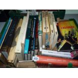 A box of books including Lincoln, The Eiger, The Long Hangover, etc.