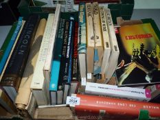 A box of books including Lincoln, The Eiger, The Long Hangover, etc.