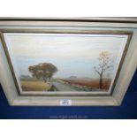 A Victor Coverley Price Oil on board, entitled verso ''A Road through the Cotswolds - autumn'',