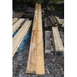 Three lengths of 7'' x 2'' x 212'' softwood. (5.