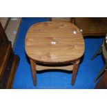 A Formica topped tavern table with under-shelf.