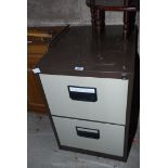 A two-drawer filing cabinet.