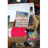 Two boxes of puzzles, marbles game, Monopoly, etc.