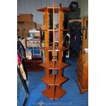 A six-shelf free-standing display unit of Danish design. 77'' high x 25'' x 17''.