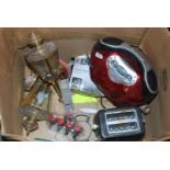 A box of a toaster, C.D. radio, brass lantern, a food mixer, an apple corer/segmenter, etc.