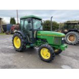 A John Deere 5500 N Four Wheel Drive Diesel-engined Farm/Orchard/Vineyard Tractor,