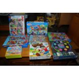 A quantity of children's games and Puzzles including Ravensburger Avengers, Thomas and Friends,