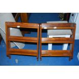 A pair of small pitch-pine, three-shelf, wall-hanging display shelves.