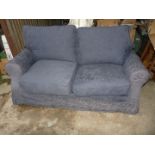 A blue fabric upholstered Sofa Bed