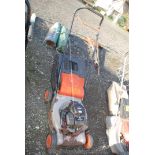 A Petrol rotary mower with Briggs & Stratton engine, (pan a/f.).