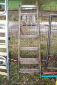 A five step wooden Step ladder.