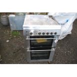A Gas and Electric cooker.