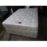 A 4'6" "Slumberland" pure wool drawer divan bed and mattress.