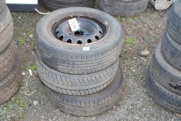 Three 175/65 R14 tyres on rims