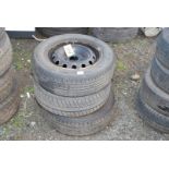 Three 175/65 R14 tyres on rims