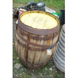 A coopered spirit barrel with mark to top.