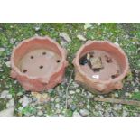 Two Terracotta circular planters.