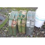 Three Jerry cans,