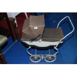 A "Roslyn" steel framed doll's pram.