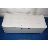 An upholstered seated blanket chest 38'' long x 14'' deep x 15'' high.