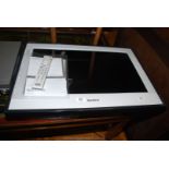 A Sony Bravia 26'' wall-mounting flat-screen T.V. with instruction book and remote controller.