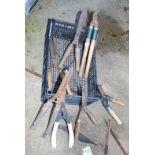 A quantity of hand shears and loppers.