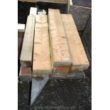 Eleven lengths of softwood timber of 8 1/2'' x 4'' x 51'' and one each 5 1/2'' square x 74'' and 5