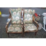 A pair of Wooden wing back arm chairs for repair.