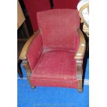 An Oak framed 1930s/40s low armchair.