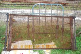 An old fashioned Single metal bedstead and base.