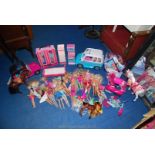 A large box of Barbie, Sindy and other dolls, clothes, horses,