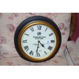 A reproduction G.W.R. Paddington Station wall clock.