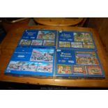 Four boxes of jigsaw puzzles, each containing 4 x 500 piece puzzles.