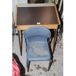 A child's desk and chair.