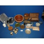 A quantity of Treen to include bowls, a pestle and mortar, wooden box, a travel iron, card box,