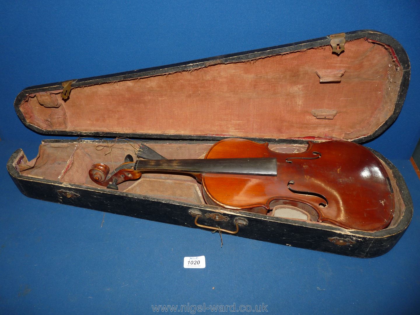 A Nippon made Violin, body 14" long, total length 23", (violin and case both a/f).