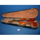 A Nippon made Violin, body 14" long, total length 23", (violin and case both a/f).
