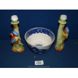 An antique pair of Candlesticks with woodpeckers on trunk and a blue and white Chinoiserie