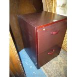 A contemporary dark-wood finished two drawer file hanging chest/filing cabinet.