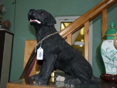 A large Leonardo Fireside Labrador dog with metal collar, 13 1/2'' high approx.